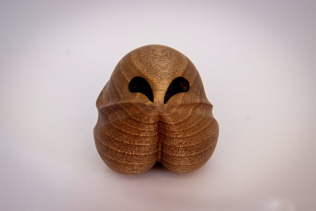 coralie-saramago-graine-d-amour-blackwalnut-tree-turned-carved-birdy-love-seed-bottom-view